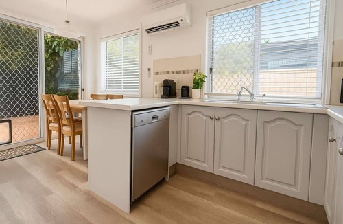 Runaway Bay House | Relaxing 2BR Getaway: Nespresso, WiFi & Parking