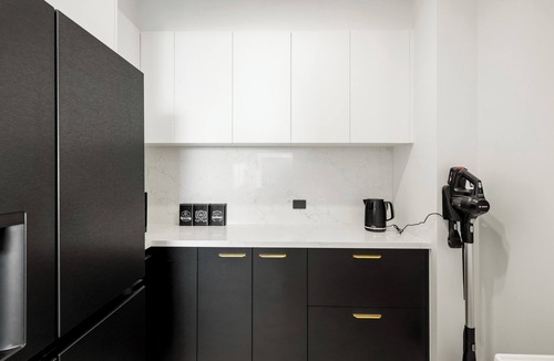 San Remo House | San Remo Luxe 1, large modern home with 180-degree bay views, outdoor spa.