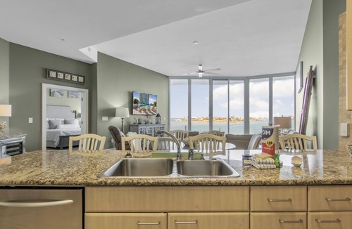 Orange Beach East House | Sensational water view condo with pools and marina
