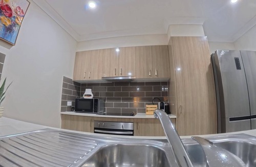 Pimpama House | Spacious 4BR Family Haven Near Gold Coast Theme Parks