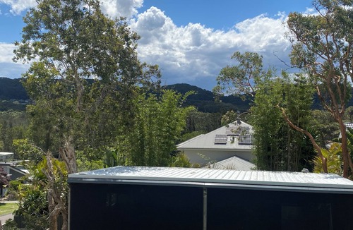 Forresters Beach House | Spacious holiday house ducted air conditioning walk to beach. In ground pool.