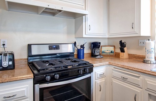 Santa Ana Heights Apartment | Spacious upper unit located just one house from the sand!