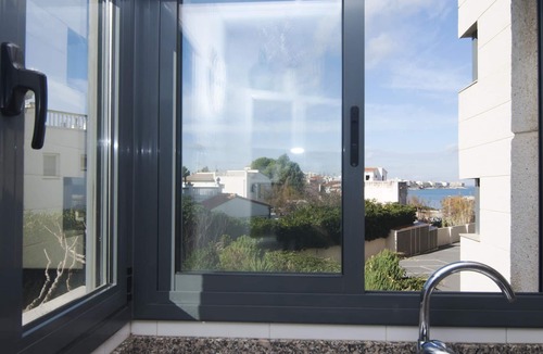 L'Escala Apartment | Spectacular apartment with communal pool and views of the port