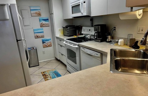 Longboat Key Condo | Steps to private beach and Gulf Coast Florida sunsets!