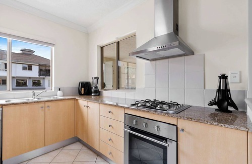 Cairns North Apartment | Stylish Lakeside Apartment w/Spa Bath & Pool View
