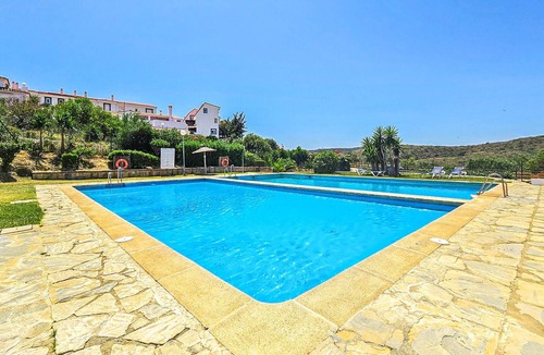 Alcorrin Apartment | Tasteful vacation apartment with shared outdoor pool and beautiful sea view.