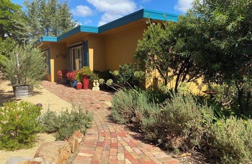 Capel Sound House | Tropical oasis/pet friendly. Golf, hot springs, beach nearby. Large games room.