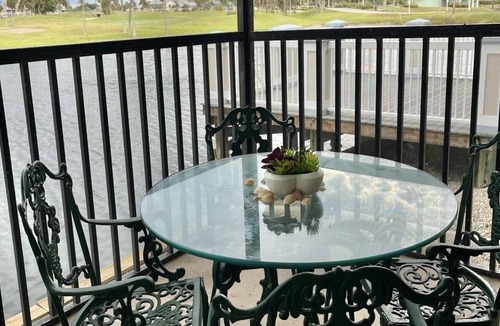 Stuart Condo | Water and Golf Course View Ocean Club Membership heated pool wifi
