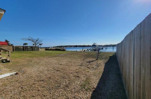 Cedar Point House | Waterfront home with Private Dock and swimming area, large fenced backyard