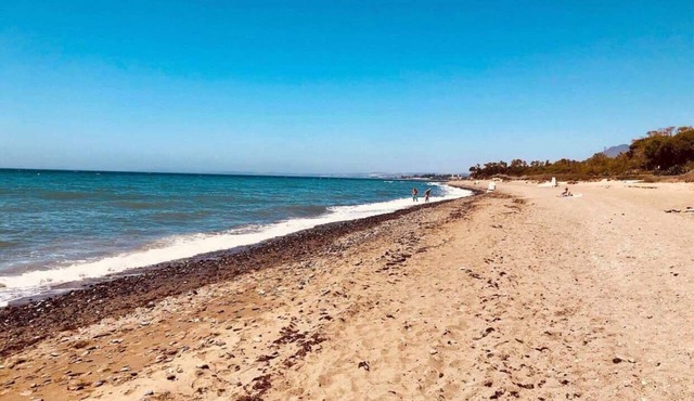 Beachfront Estepona Apartment - A family Oasis