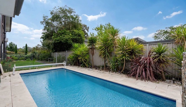 Charming 4-Bed Getaway with Pool & Garden Oasis