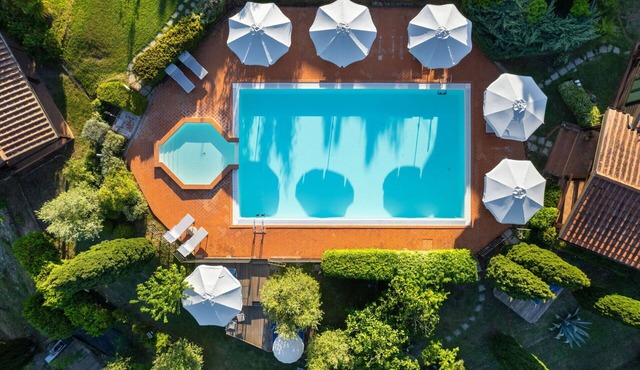 MUGHETTO, Pool view with garden in Sughera
