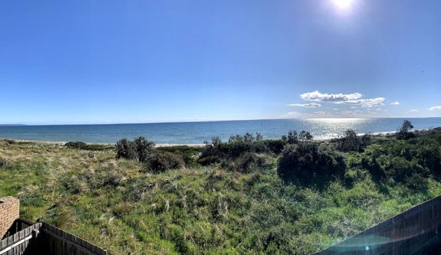 Outstanding beachfront retreat sleeps 8