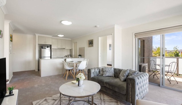 Relaxed 2BR, 2BTH Apartment with Balcony & Parking
