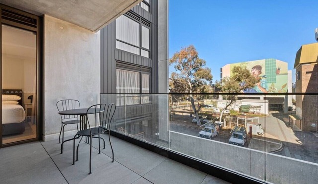 Stylish 1BR w/Private Balcony, Laundry & Parking!