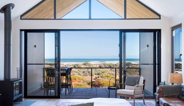 Timbers By The Sea: Beachfront Bliss with Fireplace