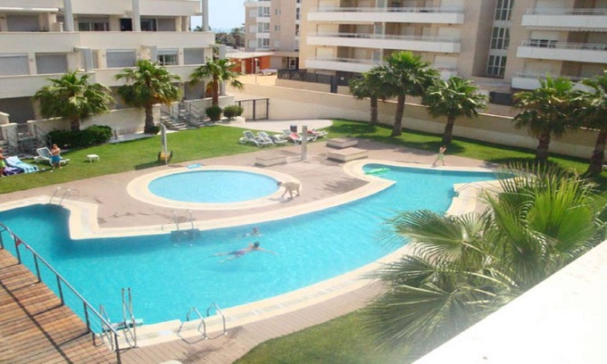 Denia Apartment | Modern apartment on the beach with large communal pool, fitness, air conditioning