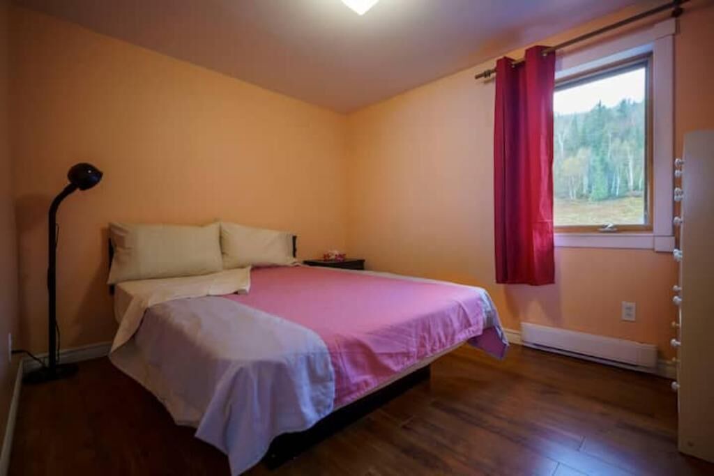 Photo of Bedroom in La Malbaie
