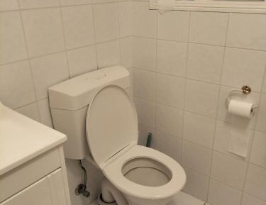 Queen Room with Shared Bathroom
