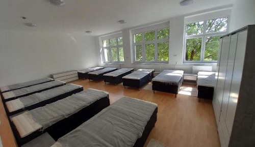 Single Bed in Dormitory Room