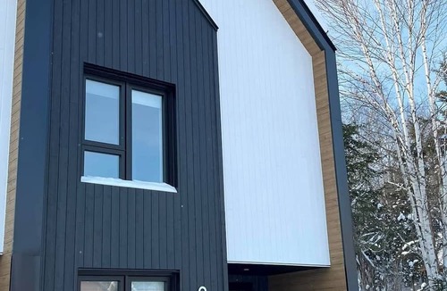 L'Anse-Saint-Jean Ski Chalet | Scandinavian chalet in the alpine village of Mont Édouard-Magnificent new construction