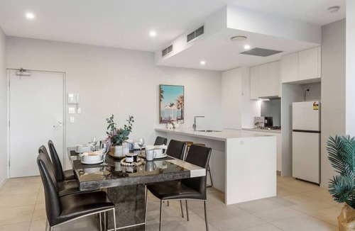Macgregor Apartment | Modern 2BR Apartment Balcony & Central Convenience