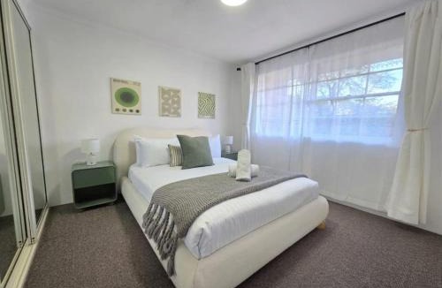 Manuka Apartment | Modern Neutral Haven with Premium Amenities