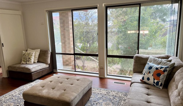 Charming 4-Bedroom Retreat with Ensuite Spa and Tranquil Backyard