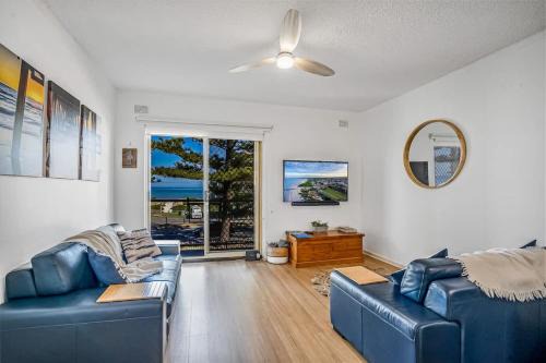 Beachfront self contained upstairs apartment