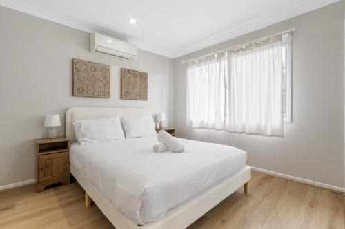 Spacious 4-Bed House with Secure Parking