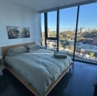 Light-Filled Apartment with City Views, Office & Parking